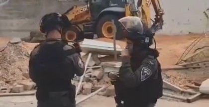 The israeli occupation forces demolish a commercial store belonging to Al-Maqdisi Muhammad Matar in the town of Jabal Al-Mukaber.