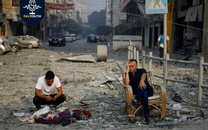 Shop owners sit on the rubble of their shops while Israel fights them for their livelihood